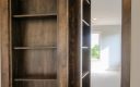 Book case into "secret" play room in this custom built home